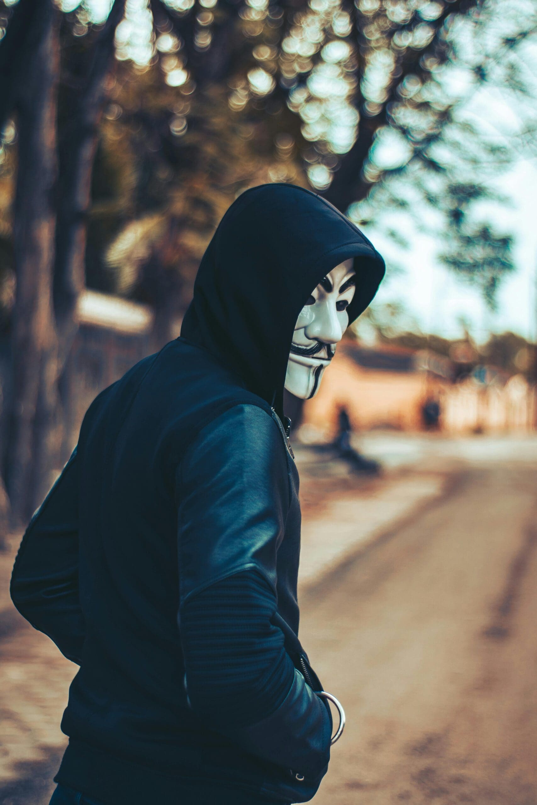 Man Wearing Hoodie and Mask